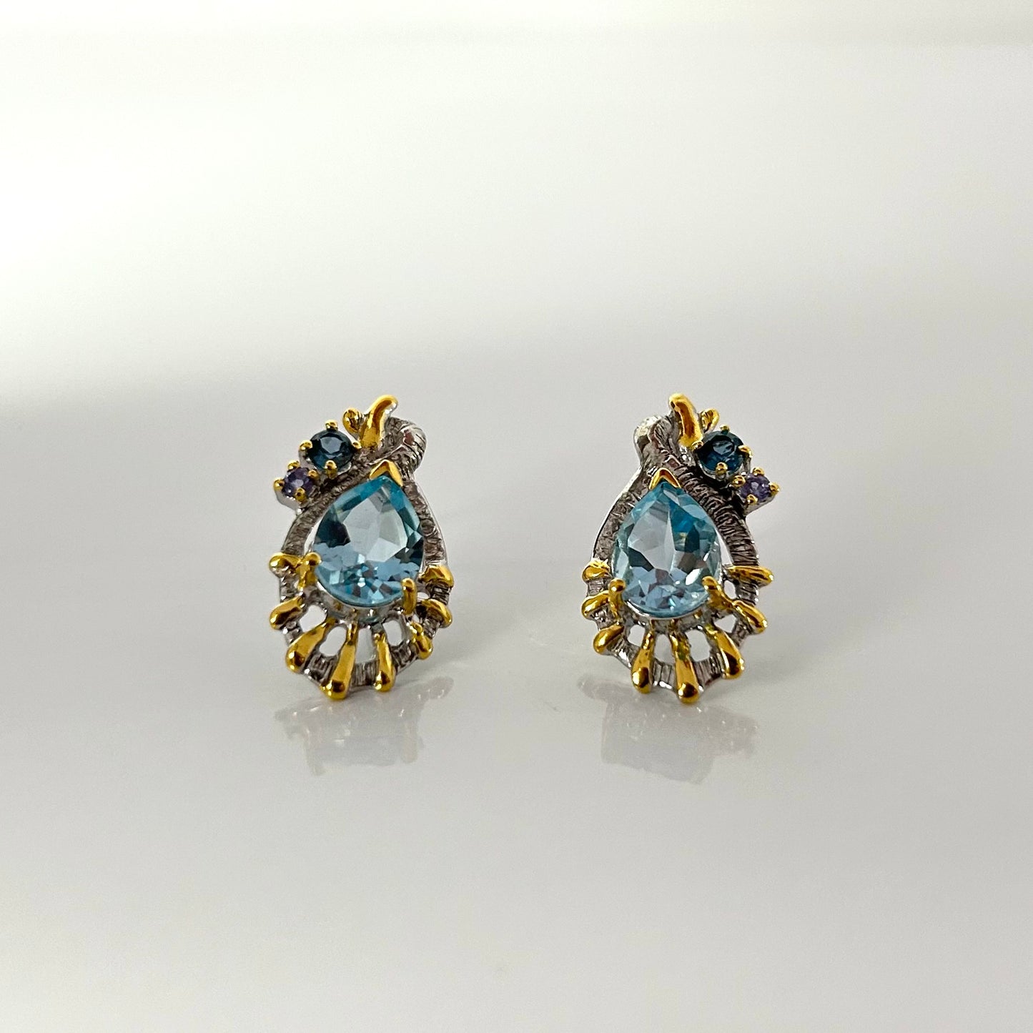 Sophisticated earrings with a Sky-London Topaz and rich Tanzanite stones