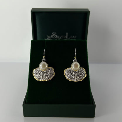 Pair of earrings with pearl and leaf design in a 'Silver Leaf' branded box.