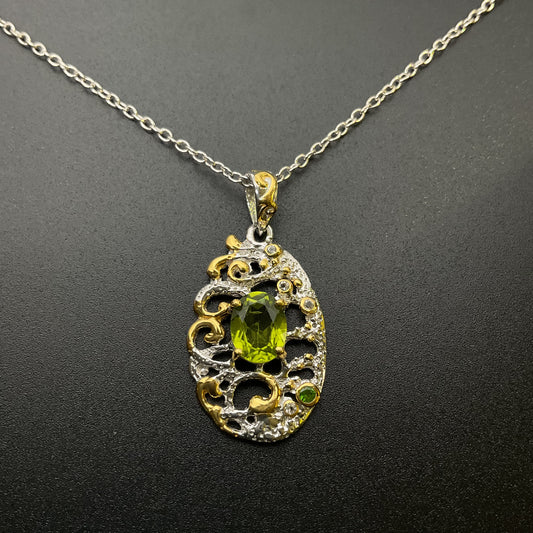 Decorative necklace with a green peridot gemstone on a dark background