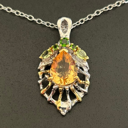 Silver Citrine pendant necklace on a dark background