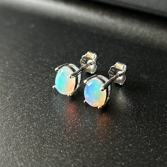 Opal stud earrings.