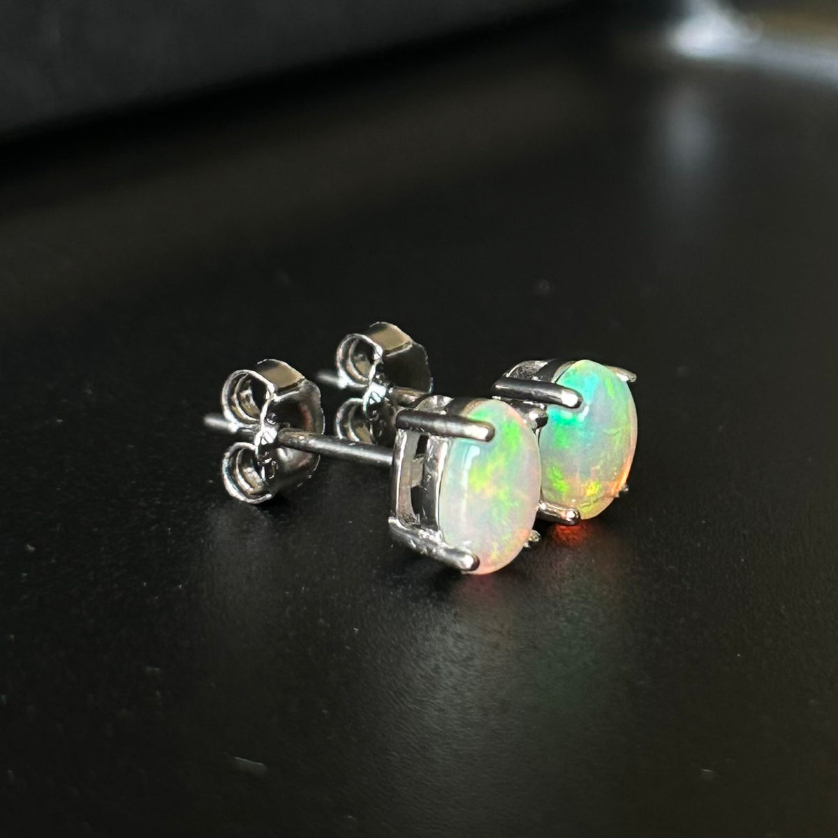 Opal stud earrings.