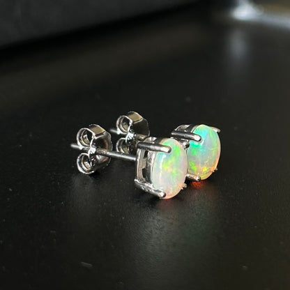 Opal stud earrings.